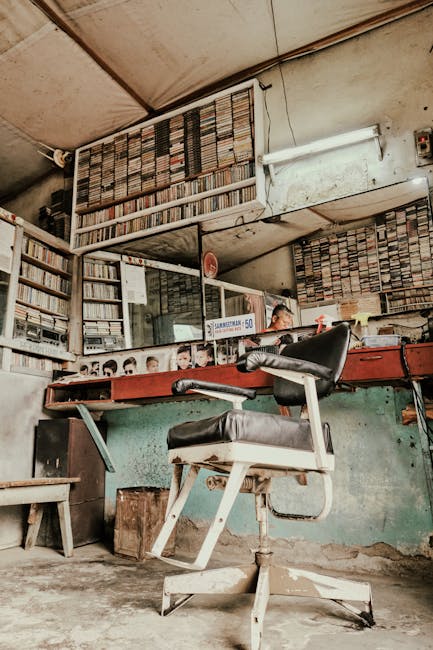 Interior vintage de la barbería con colección de casetes, silla clásica y estética retro